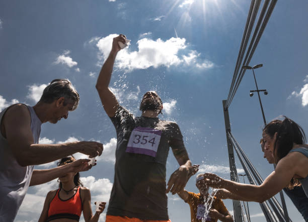 istock Refreshment on marathon race during hot summer day! 979901238