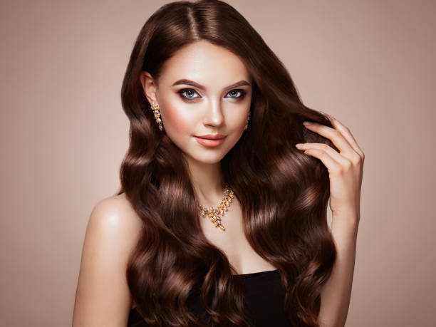 istock Brunette woman with curly hair 979910270
