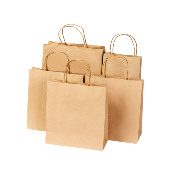 istock Recycled Paper shopping bag isolated on white 979910774