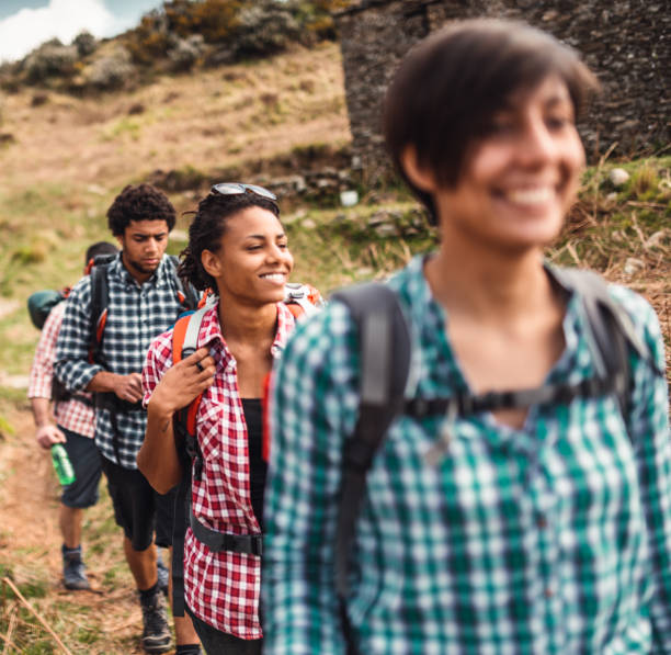 istock friends hiking in the mountains 979916658