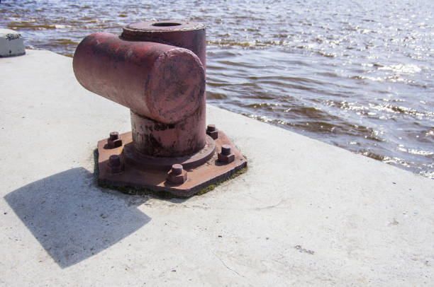 istock Mooring bollard on a concrete pier 979920238