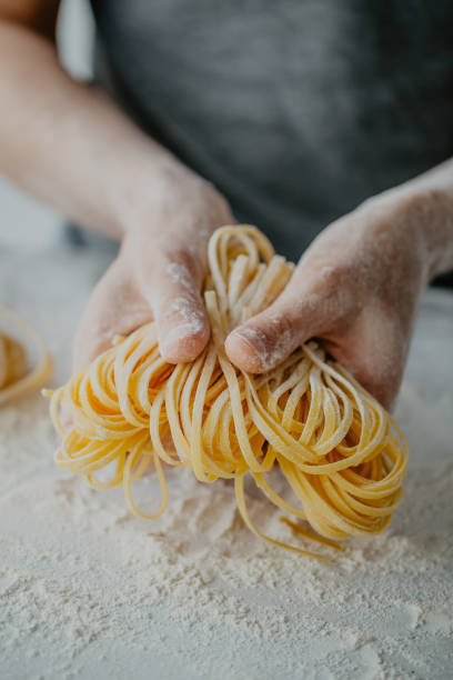istock Chef making traditional italian homemade pasta 979924946