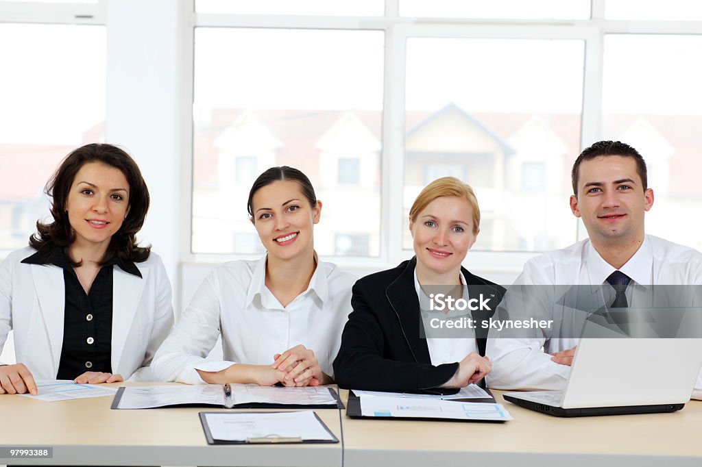 People sitting together in corporate location.  Active Seniors Stock Photo
