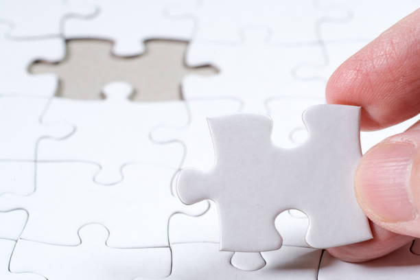 istock White Blank jigsaw puzzle, business concept of Solution 979937730