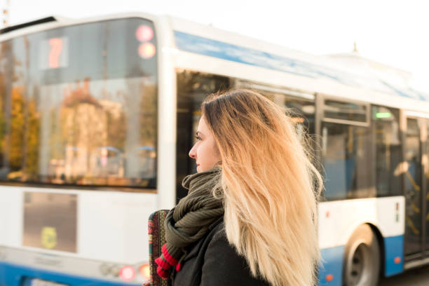 istock Young woman waiting for the bus 979940244