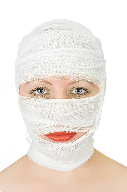 istock woman with bandage 97994085