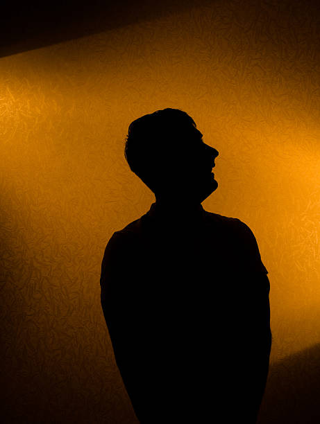 istock Studio shot - silhouette of man 97994117
