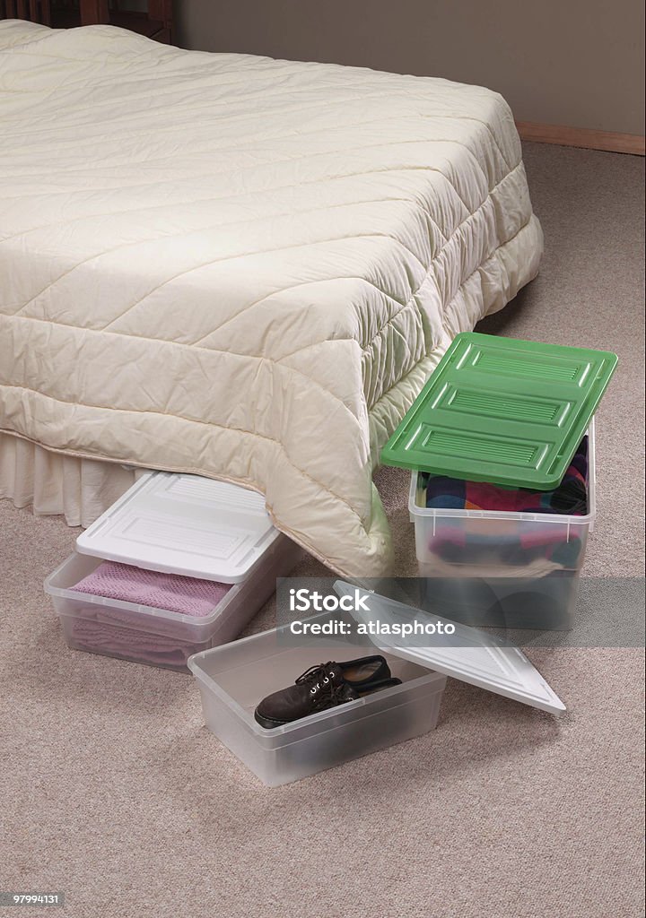storage containers in bedroom  Bed - Furniture Stock Photo