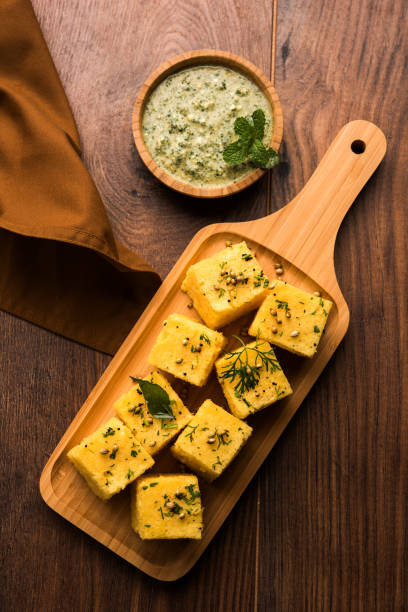 istock Chana Dal Dhokla served with mint chutney, selective focus 979941560