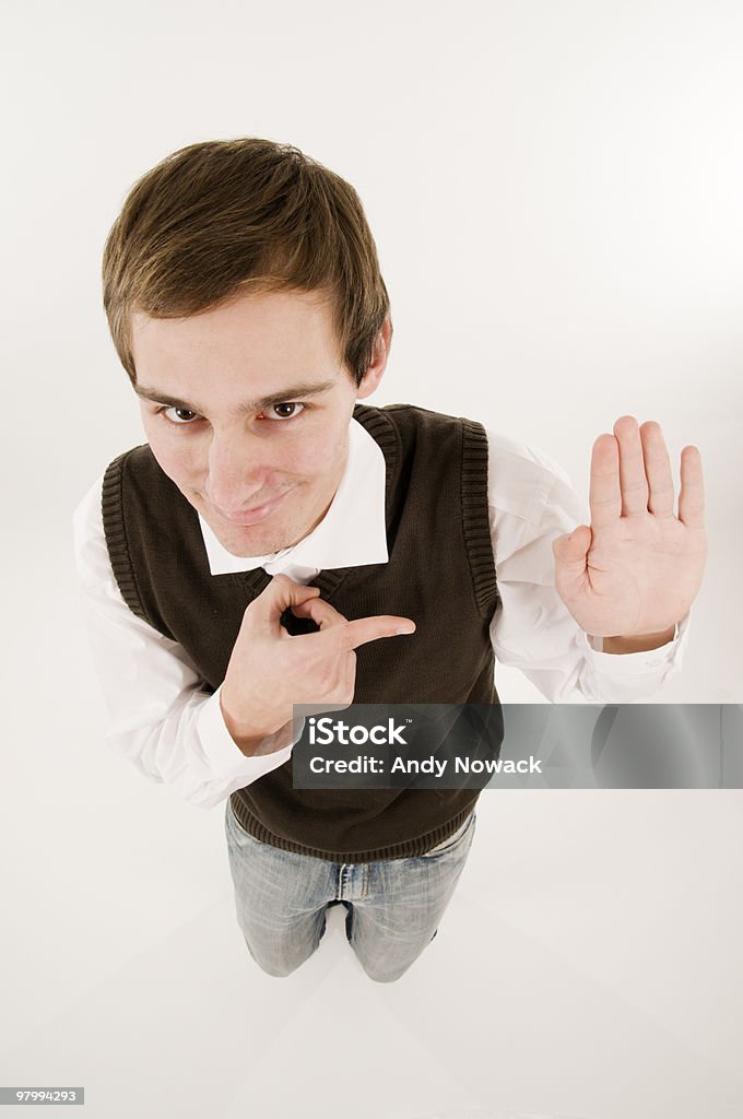 show the oath hand top view young man take an oath and show with her right index finger to the left oath hand; wide angle from above on white background Adult Stock Photo