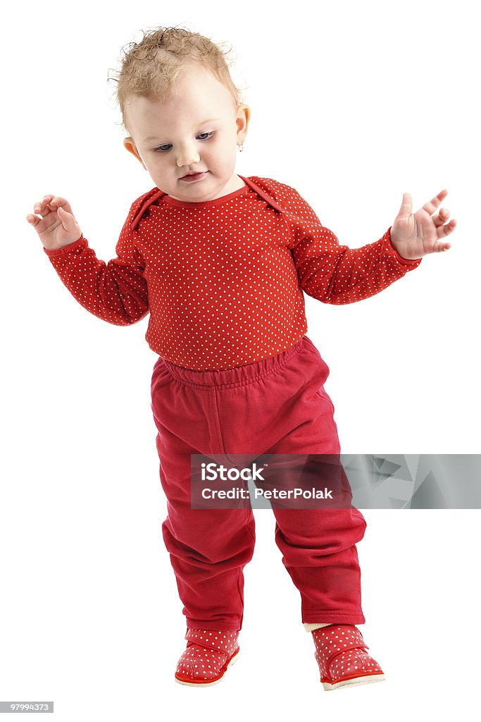 Cute baby girl learning to walk isolated on white background  Cut Out Stock Photo