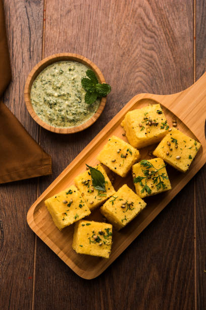 istock Chana Dal Dhokla served with mint chutney, selective focus 979954712