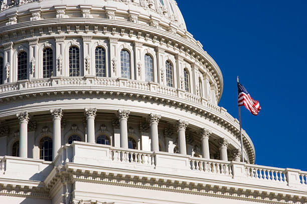 istock American Flag Flies Over Capitol Dome 97995532