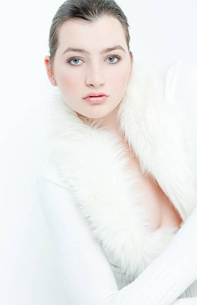 istock woman wearing white sweater 97996370