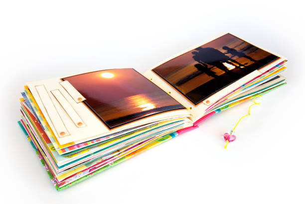 istock Open scrapbook album on white 97997099