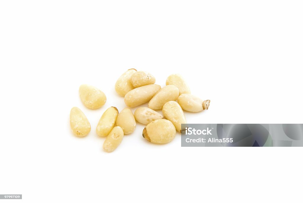 Few pine nuts on white  Pine Nut Stock Photo