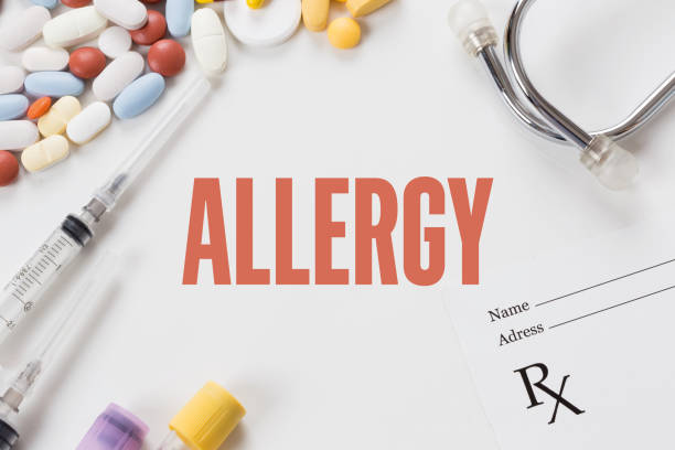 istock ALLERGY written on white background with medication 979974336