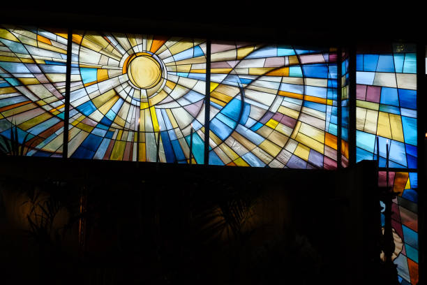 Church colorful glass paint on a wall representing sun rays
