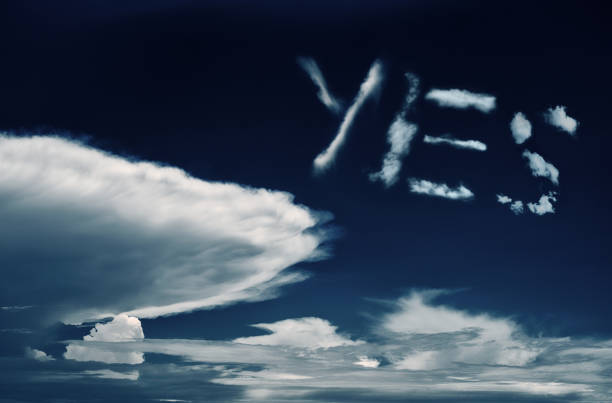 istock YES written in the sky with clouds 979994824