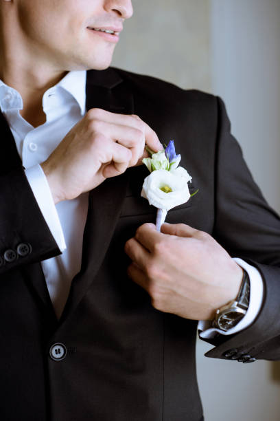 istock Groom is wearing a suit indoors 979996672