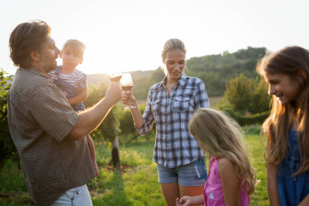 istock Winemaker family together in vineyard 979997224