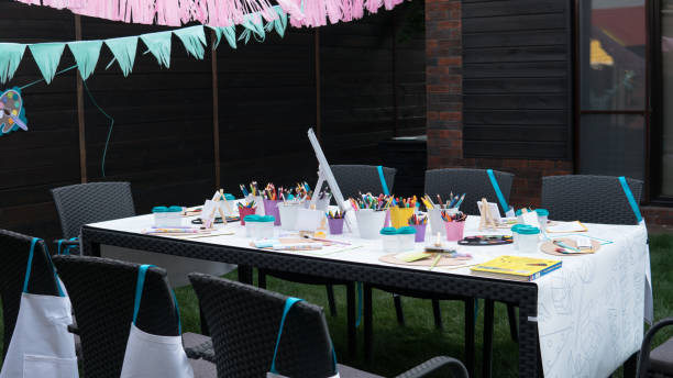 istock children's drawing school, children's creativity with brushes and felt-tip pens close-up. 979997406