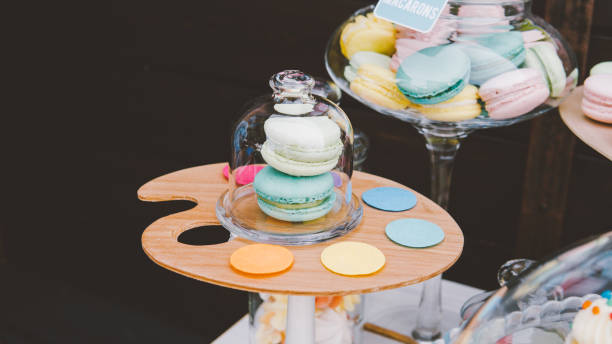 istock colorful French macaroons at a buffet table. Traditional macaroons close-up. 980001224
