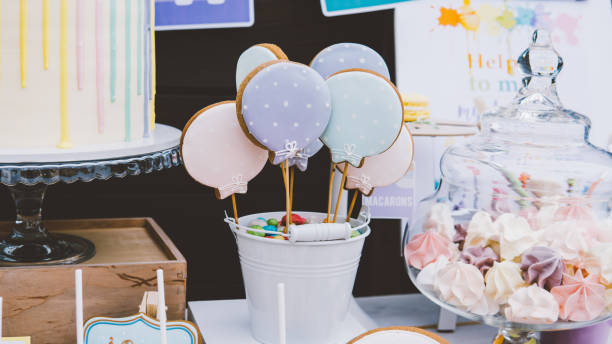 istock macaroons, meringues, gingerbread at a children's party close-up. 980001254