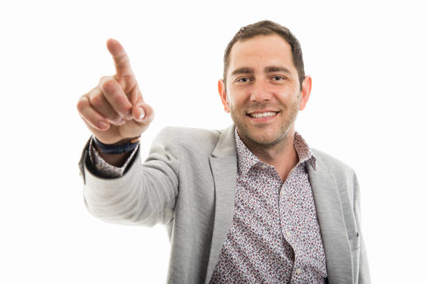 istock Portrait of business man using invisible touchscreen 980002472