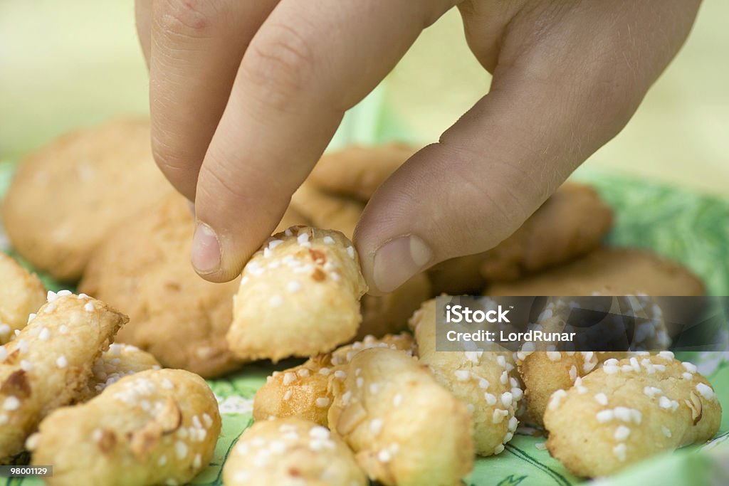 Nabbing a cookie  Arranging Stock Photo