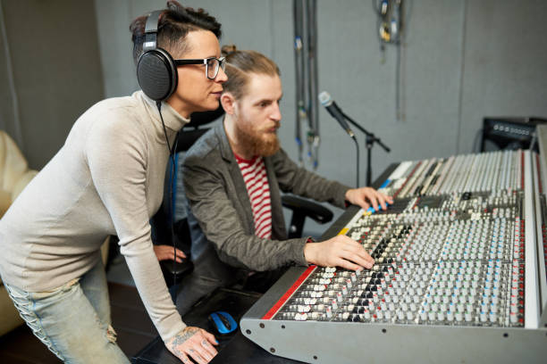istock Coworkers in process of creating music 980011342