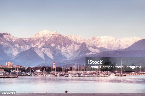 The Apuan Alps From The Marina Di Carraras Docks Stock Photo - Download Image Now - Carrara, Sea, Liguria