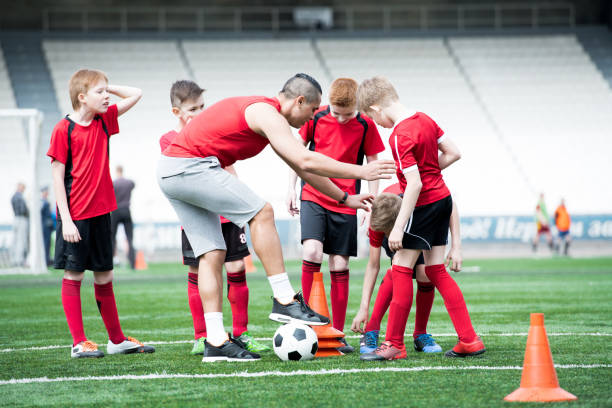 istock Football Exercises in Field 980018200