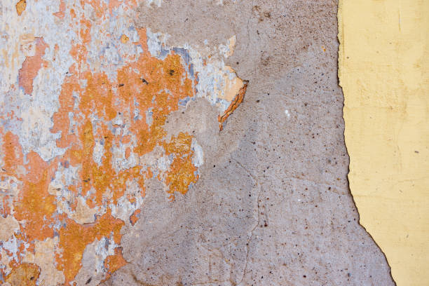istock Old Cracked Weathered Shabby Plastered Peeled Wall Background 980027848