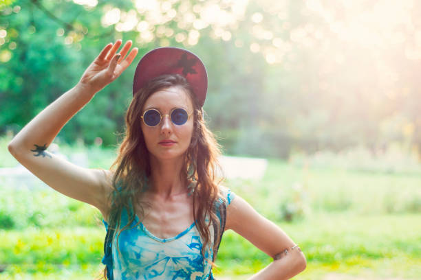 istock Young woman in a park 980030746