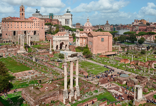Rome, ruins of the imperial holes, altar of the Fatherland in the background