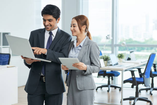 istock Business people with gadgets 980057394