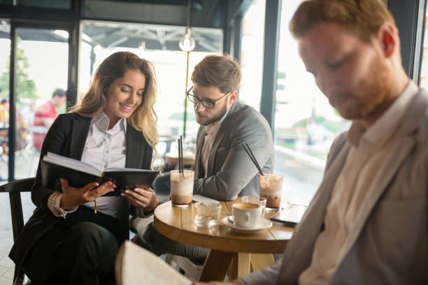 istock Business people talking and laughing together 980067380