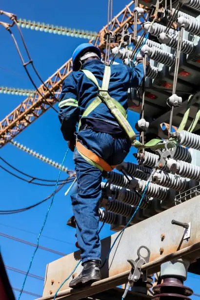 Photo of Man working on Electric Power Lines