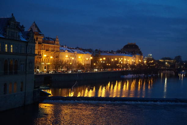 istock buildings on the Vltava river, night landscape 980095856