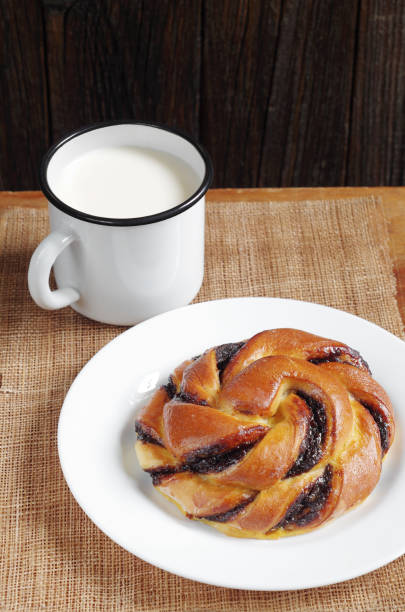 istock Bun and mug of milk 980097224