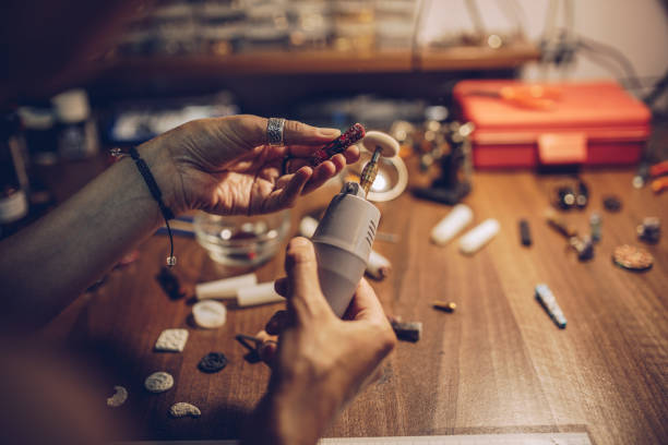 istock Woman making jewelry 980100342