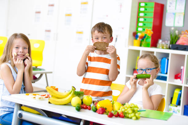 istock Students prepare their healthy snack themselves 980101000