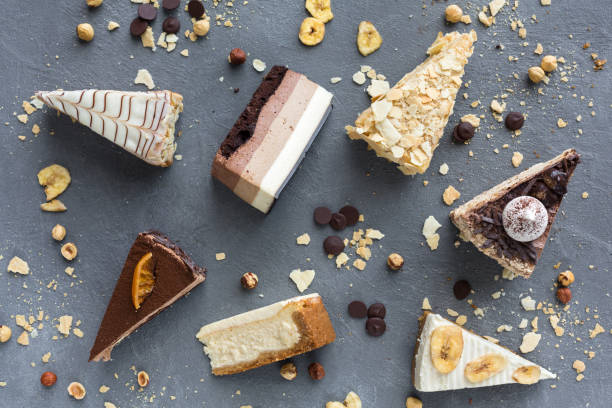 istock Assortment of pieces of cake, copy space 980105614
