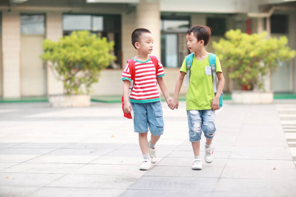 istock Children Walk to School 980106970