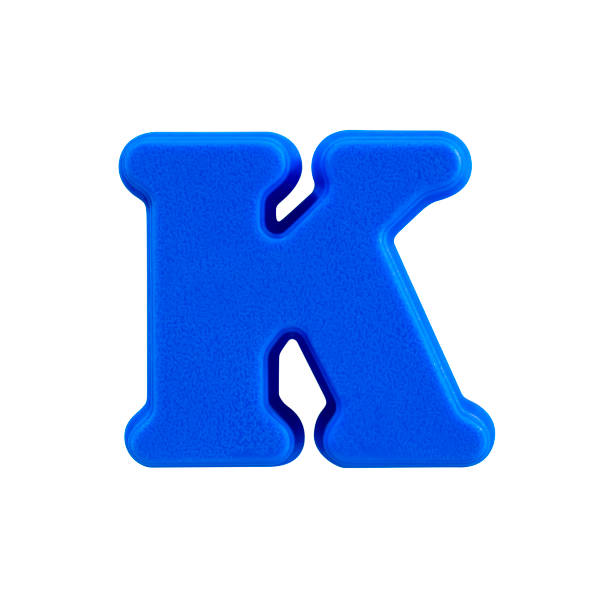 istock letter K uppercase alphabet plastic on white background with Clipping path 980109650