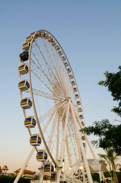 istock Beautiful large Ferris wheel. And the blue sky. 980109854