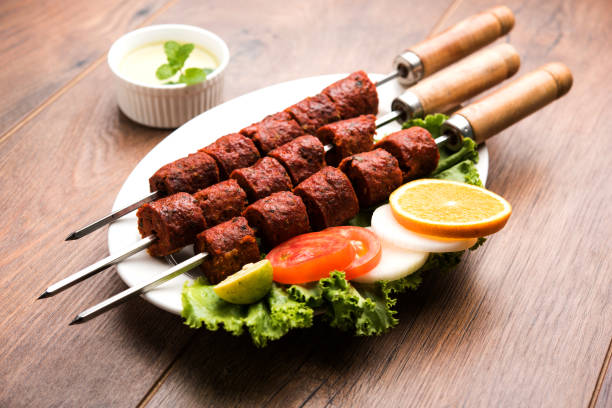 istock Indian Mutton Seekh Kabab served with green salad, selective focus 980111172