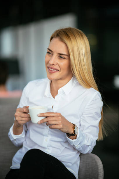 istock Woman having coffee in cafe bar 980114292