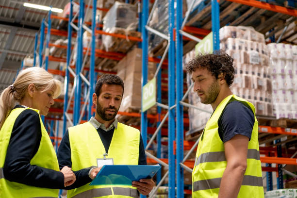 istock Managers checking the list of products 980114344